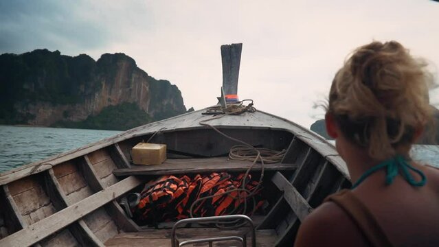 Krabi Longtail Boat To Railay Beach; Female Tourist Traveling In Thailand, Southeast Asia.