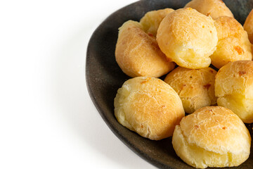 pão de queijo isolated on a white background (also known as cheese bread or cheese bun)