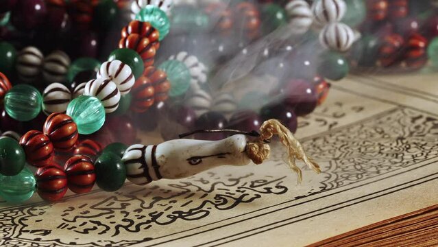 Religion The Book of Islam Quran and Rosary Beads
