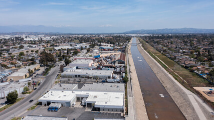 Aerial view of the Rio Hondo River as it flows through Downey and Bell Gardens, California, USA.