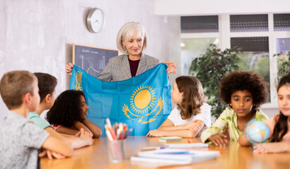 Kids learning together about kazakhstan in geography class