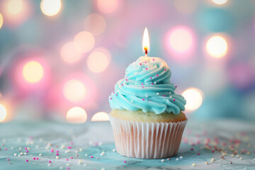 Festive Birthday Cupcake with Colorful Sprinkles. A birthday celebration depicted through a delectable cupcake with white frosting and multicolored sprinkles, a lit candle standing tall.