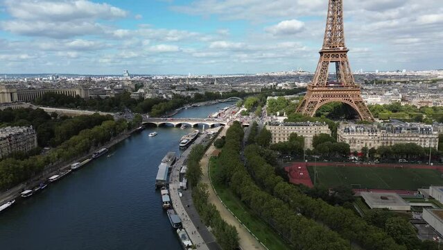 Pont d'I&eacute;na bridge on Seine river and Tour Eiffel. Aerial drone view