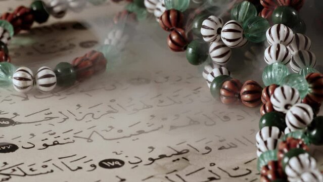 Religion The Book of Islam Quran and Rosary Beads