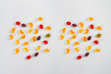 Fruit gummi candies assortment on white background 