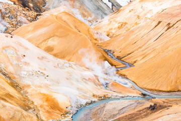 Bridge Over Blue Stream In Orange Geothermal Area