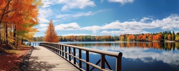 Fototapeten Autumn season nature landscape, lake bridge in fall © Hanasta