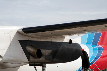 The exterior of a white propeller airplane in Luang Prabang, Laos