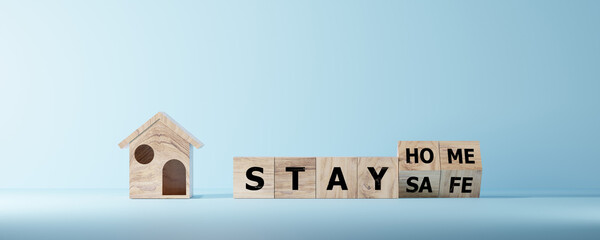 Stay at home stay safe message on wooden cubes.