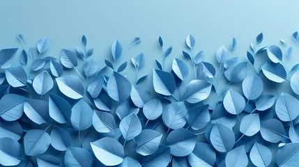 Foto op Aluminium blue background with a bunch of leaves.Collection of tropical leaves,foliage plant in blue color with space background © Imran