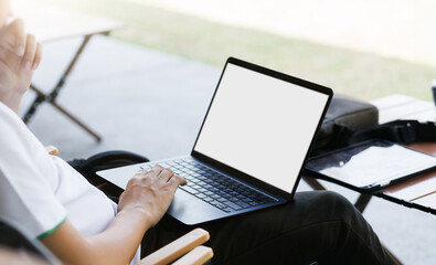 A man working or study online via computer laptop outdoor