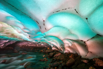 Kamchatka, colour snow vaults of the hidden river on the slopes of Mutnovsky volcano