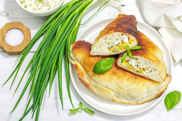 Homemade patty pies with cottage cheese and greens. High protein food, gluten free bakery
