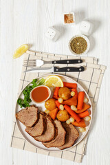 roast beef with dipping sauce and winter veggies
