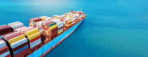 Side view Cargo Container ship in the ocean ship carrying container and running for import export concept technology freight shipping by ship