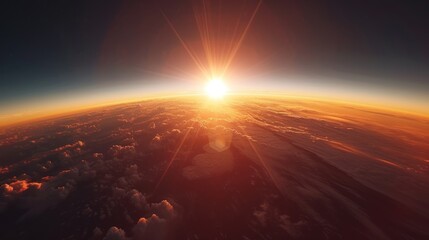 The sun setting behind the horizon of planet Earth, view from space