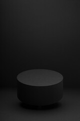 Soaring black round podium, mockup on black background, shadow, vertical. Template for presentation cosmetic products, gifts, goods, advertising, design, display, showing in exquisite modern style.