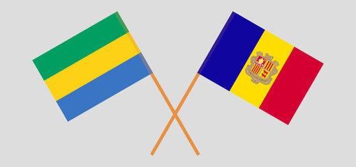 Crossed flags of Gabon and Andorra. Official colors. Correct proportion