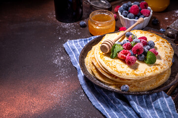 Crepes pancakes with berry