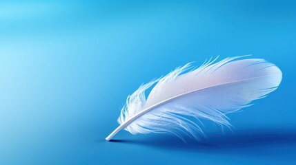 a close up of a white feather on a blue background with a blurry image of a bird's wing.