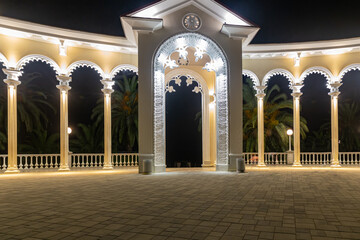 View of the luminous night colonnade in the Caucasus