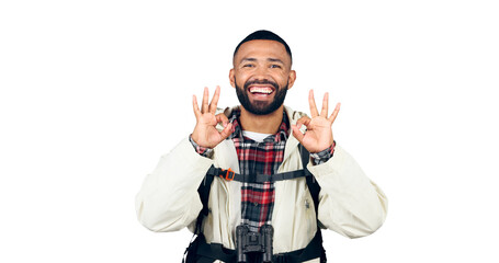 Okay sign, hiking and portrait of man with smile, backpack isolated on transparent png background....