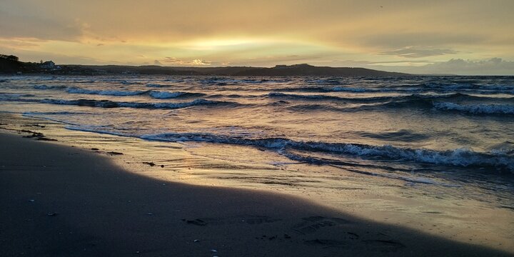 SUNSET AT THE BEACH