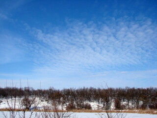 Unsurpassed natural beauty in the blue frosty sky created with sun brush and cloud colors.