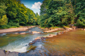 Obraz premium Beautiful summer view of Pid Skelyamy waterfall. Bright morning view of Sukel' River. Exciting landscape of Carpathian mounatains, Ukraine, Europe. Beauty of nature concept background.