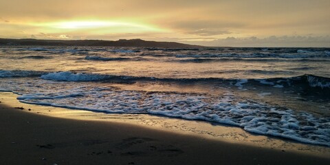 Fototapeta premium SUNSET AT THE BEACH