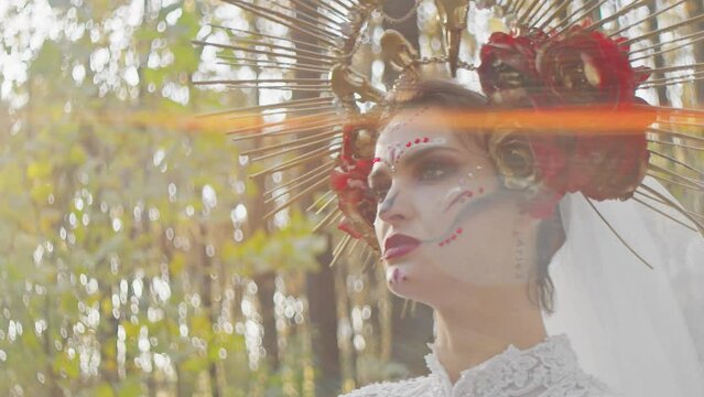 Halloween horror brought to life by a woman in a skull makeup, her face a tribute to Santa Muerte, clad in a red, Mexican-inspired dress, evoking both fear and beauty.