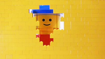 Naklejka premium Hong Kong -February 15 2024: a giant man is watching through the small hole of wall