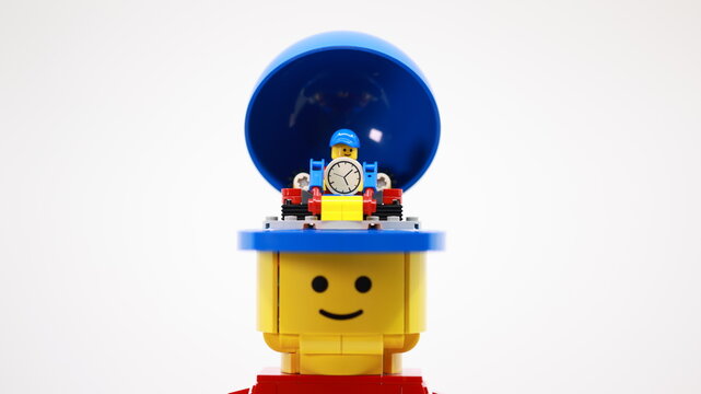 Hong Kong -February 15 2024: a giant man's head have a little man inside his brain to arrange his clock