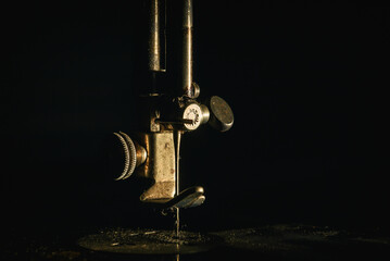 NEEDLE - Fragment of an old manual sewing machine
