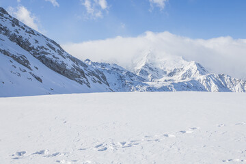 Fototapeta na wymiar footprints in the snow at the top of Franz Josef's glacier. New Zealand