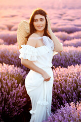 Portrait of a girl in lavender field holding violet lavender flowers
