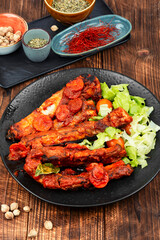 Roasted yummy pork ribs in sauce.