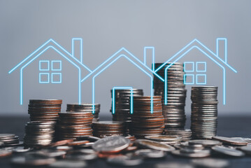Stack of coins with digital overlay of housing market growth. investment, property finance real estate business concept.