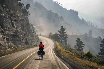 A cyclist on an empty mountain pass