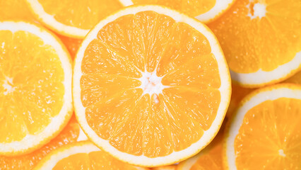 Close-up of orange slices spinning in a circle. Fruit orange.