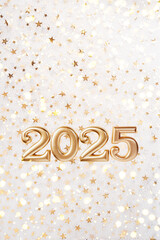 Holiday background Happy New Year 2025. Numbers of year 2025 made by gold candles on bokeh festive sparkling background. celebrating New Year holiday, close-up. Space for text