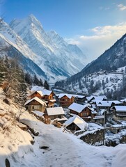 Alpine Villages in Winter: Snow-Capped Mountain View with Charming Village at Mountain Base