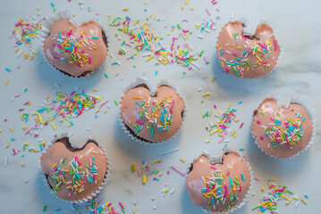 Chocolate cupcakes decorated with fresh cream raspberries 