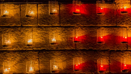 glowing candles in a row