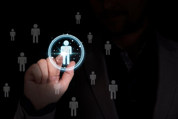 Businessman touching to virtual human icon for focus customer group or human recruitment and...