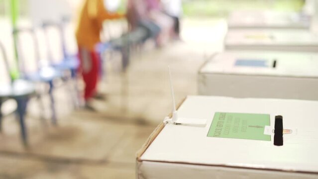 Officers locking voting ballots during Indonesian Pemilu election