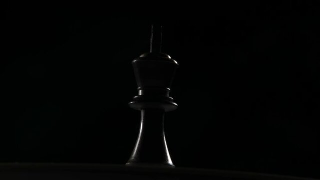 Cinematic shot of a Queen chess piece.