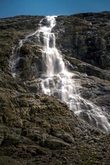 Obraz premium Alpine panorama with waterfall during the summer in the South Tyrol