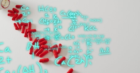 Image of mathematical equations over pills