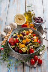 chicken salad with zucchinis cherry tomatoes black olives and lemon - 737012585